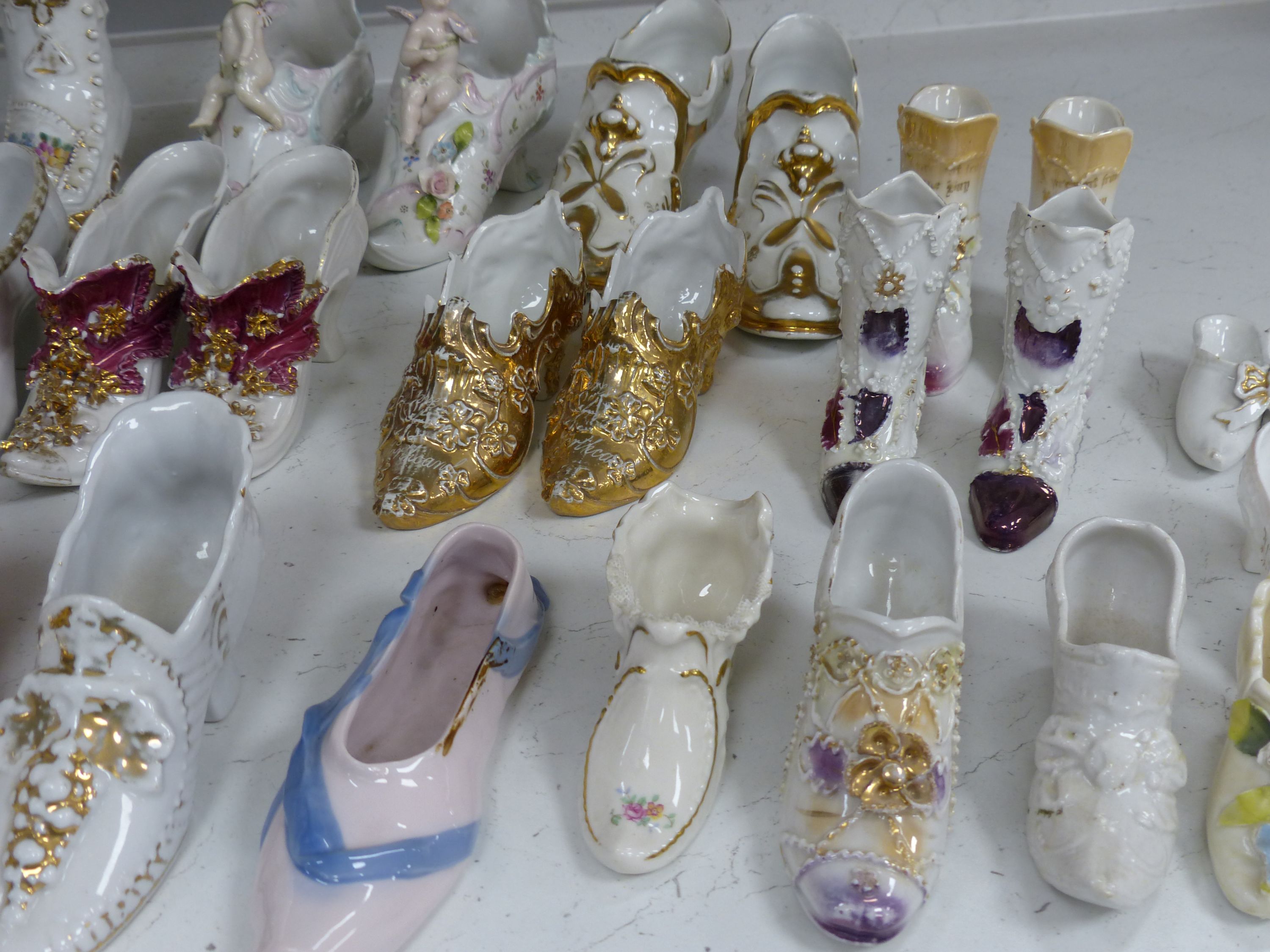 A collection of ceramic shoes